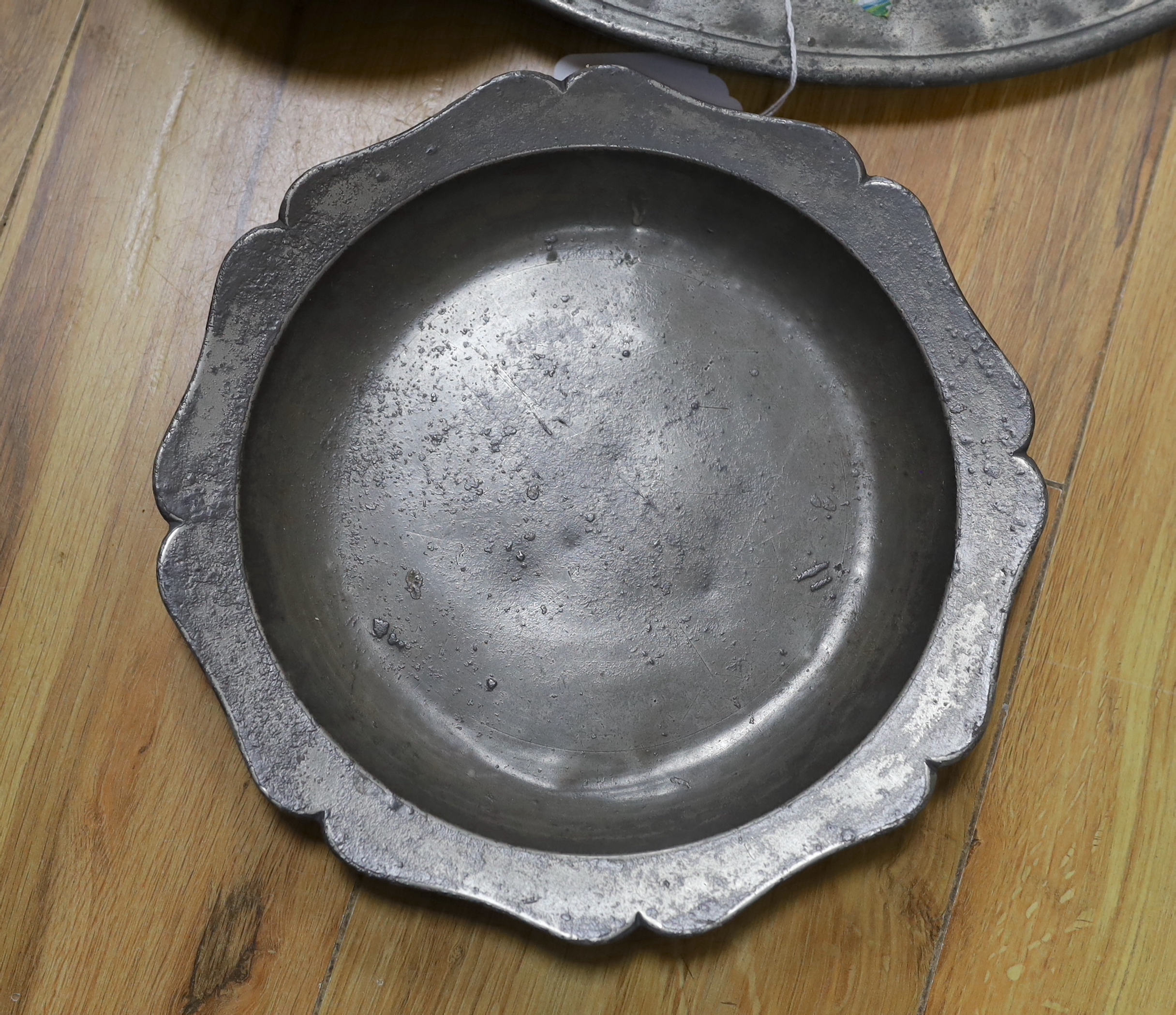 A collection of 18th century and later pewter chargers/plates